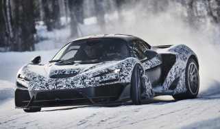 McLaren W1 winter testing - front tracking shot, car drifting on snow 